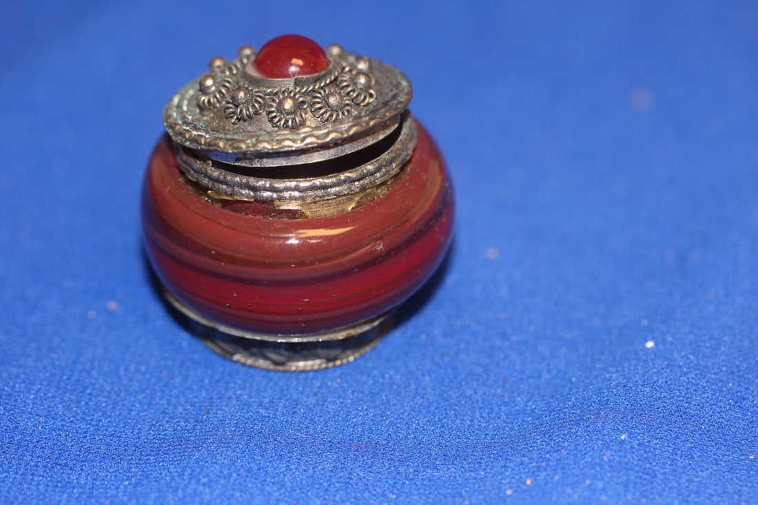 An Oriental Glass and Metal Trinket Box: 2 inches in diameter