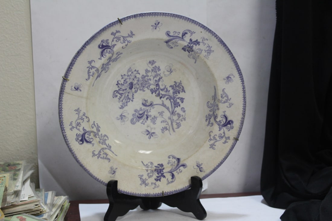 An Ironstone Blue and White Bowl: please note: hairline - 10 1/2" in diameter