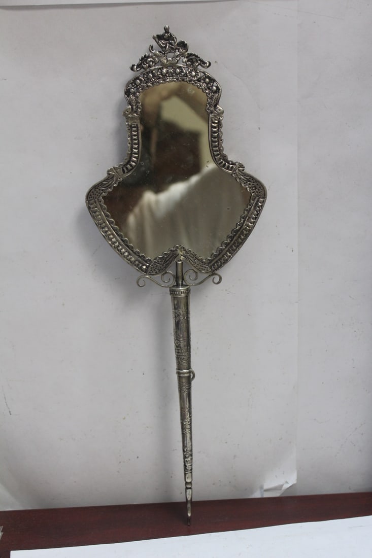 A Dutch Silver Ornate Mirror: most likely sterling silver - 14 5/8" long