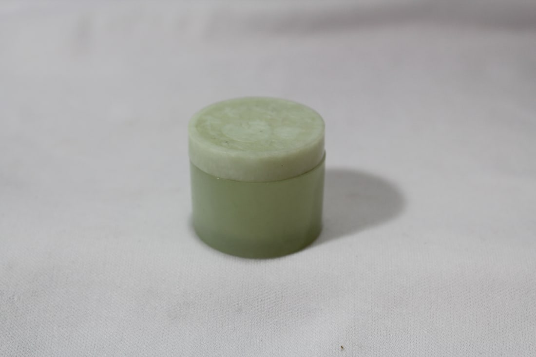 An Etched Jade Cylinder Box: 1 3/8" in diameter