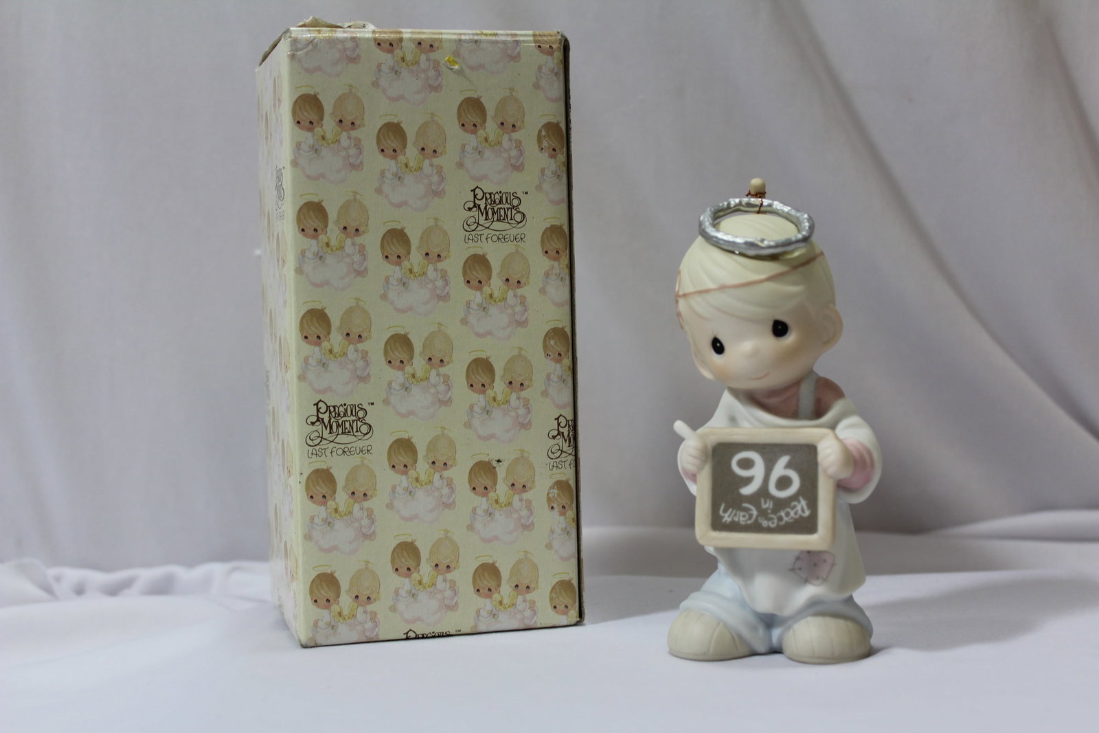A Precious Moments Figurine: boxed - 5 1/8" tall