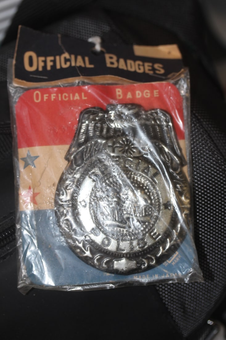 Official Badges: still sealed