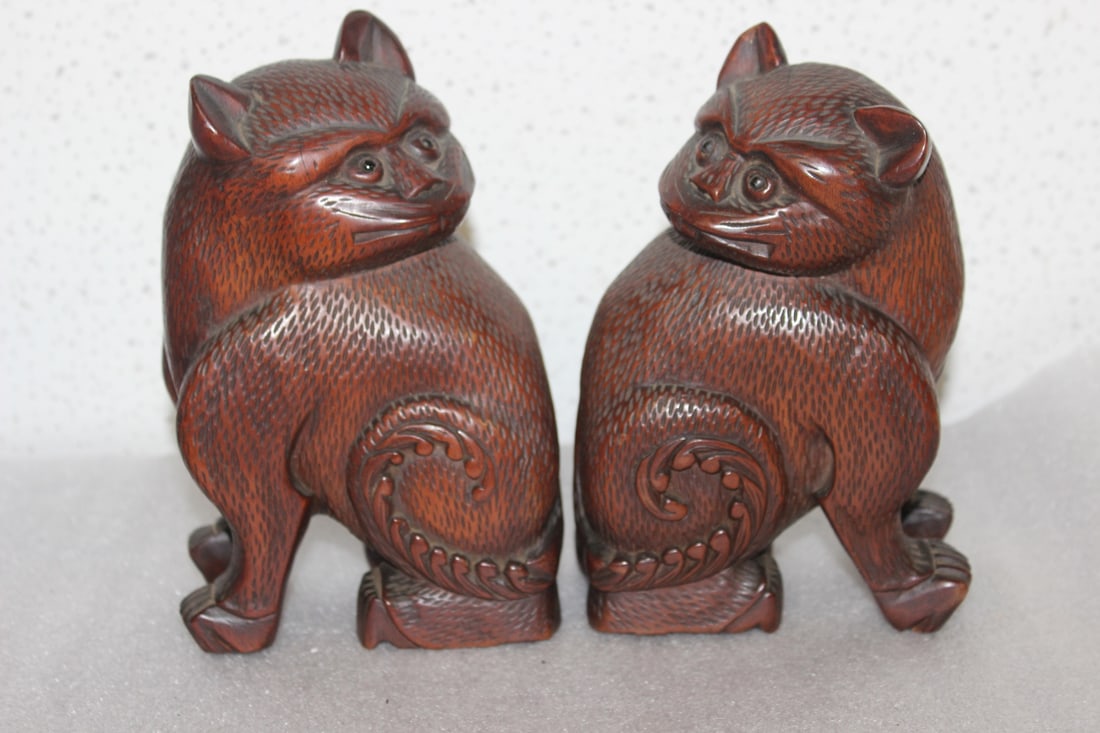 A Pair of Chinese/Asian Wooden Bookends: Well carved - please note: splits due to age - 7" tall - most likely early to mid 20th century