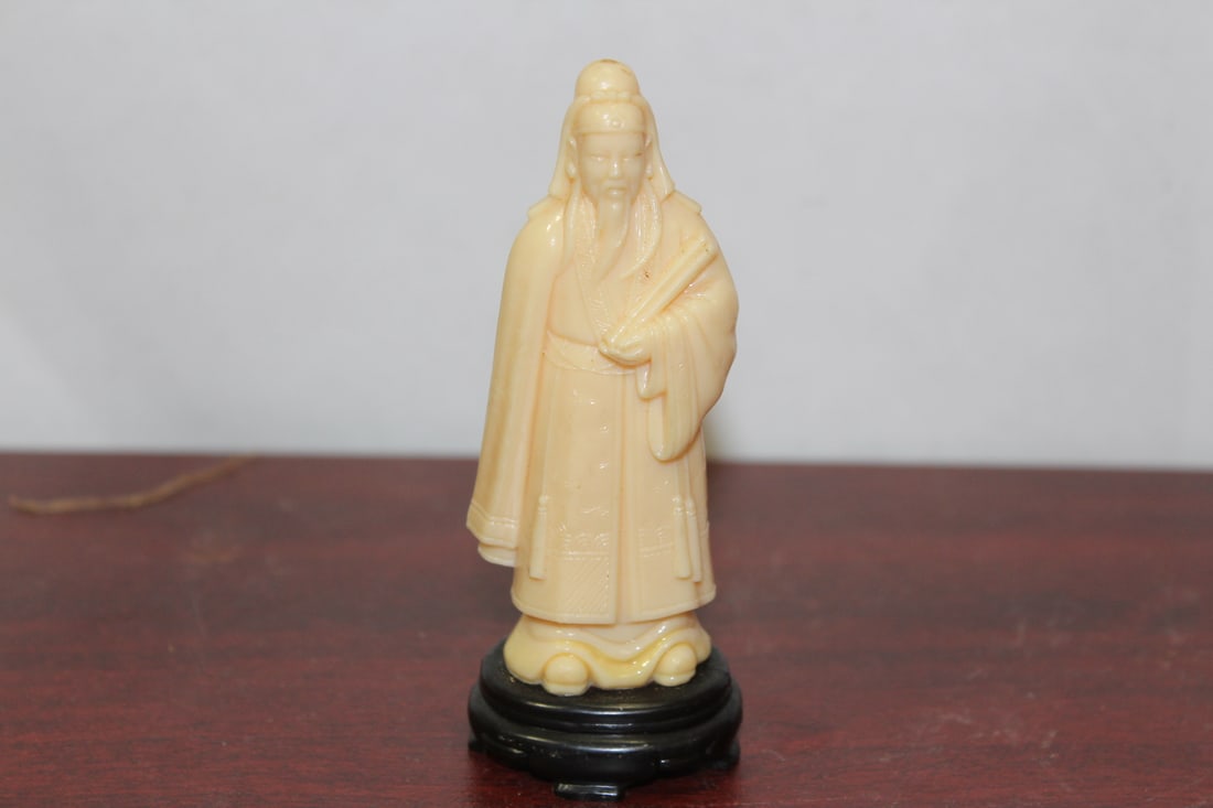 A Vintage Plastic Figurine: made in Hong Kong - 4 1/4" tall