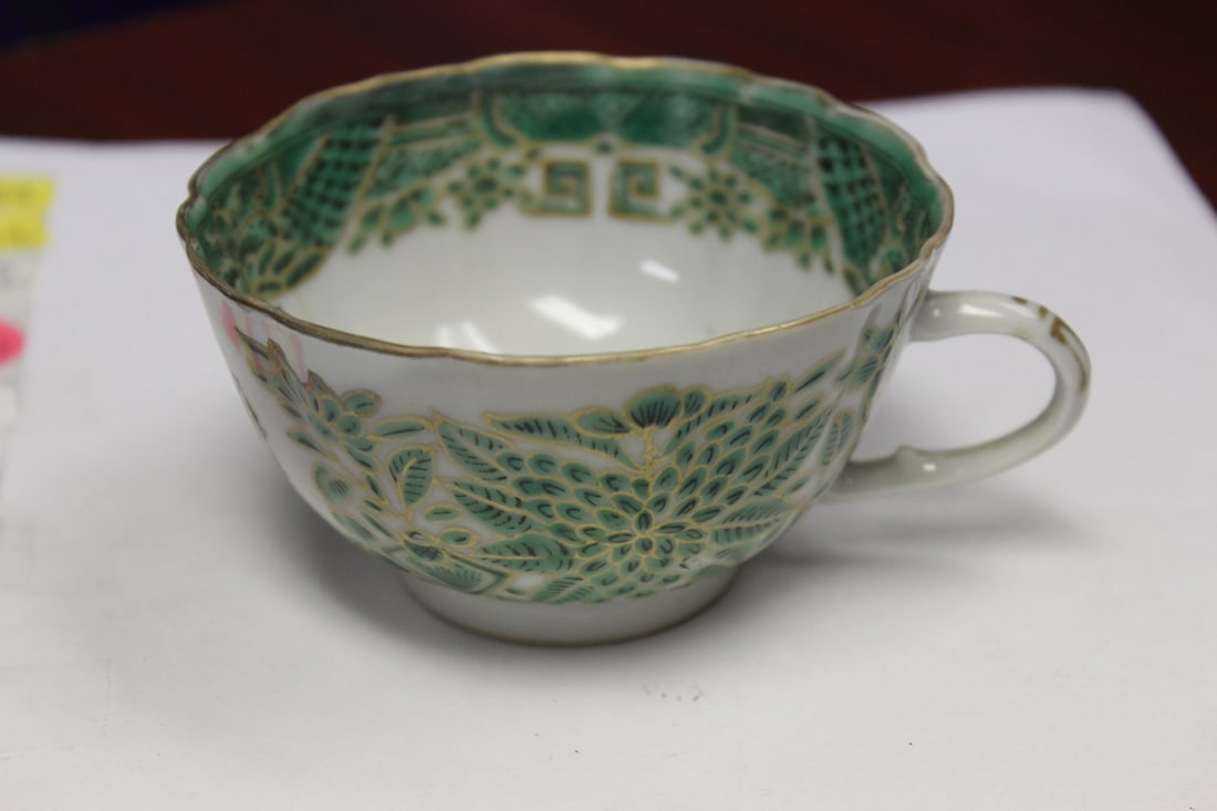 A Chinese Famille Vert Cup: Please note: one small hairline - 3 3/4" in diameter