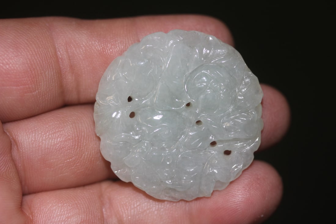 Jadeite Disc: well carved - 1 1/2" in diameter - carved on both sides