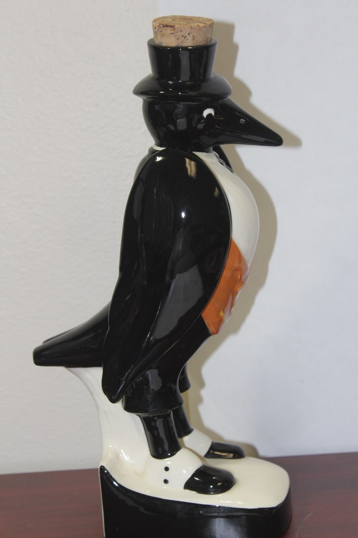 Ceramic Black Penguin Royal Doulton Spirit Bottle: rare - please note: bottle is empty - 12 1/2" tall