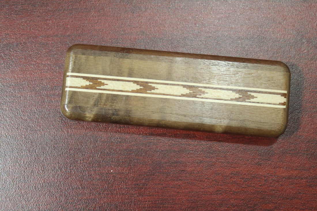 An Inlaid Wooden Slide Trinket Box: 4" long