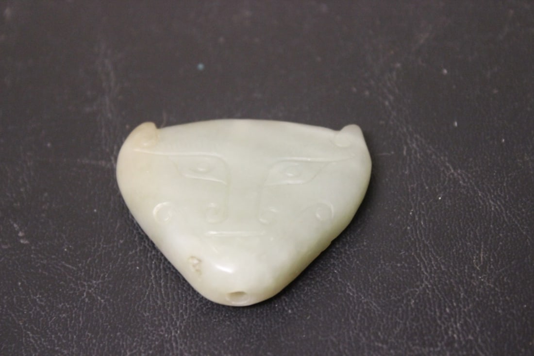 A Nephrite Jade Ornament: 1 3/4" in diameter