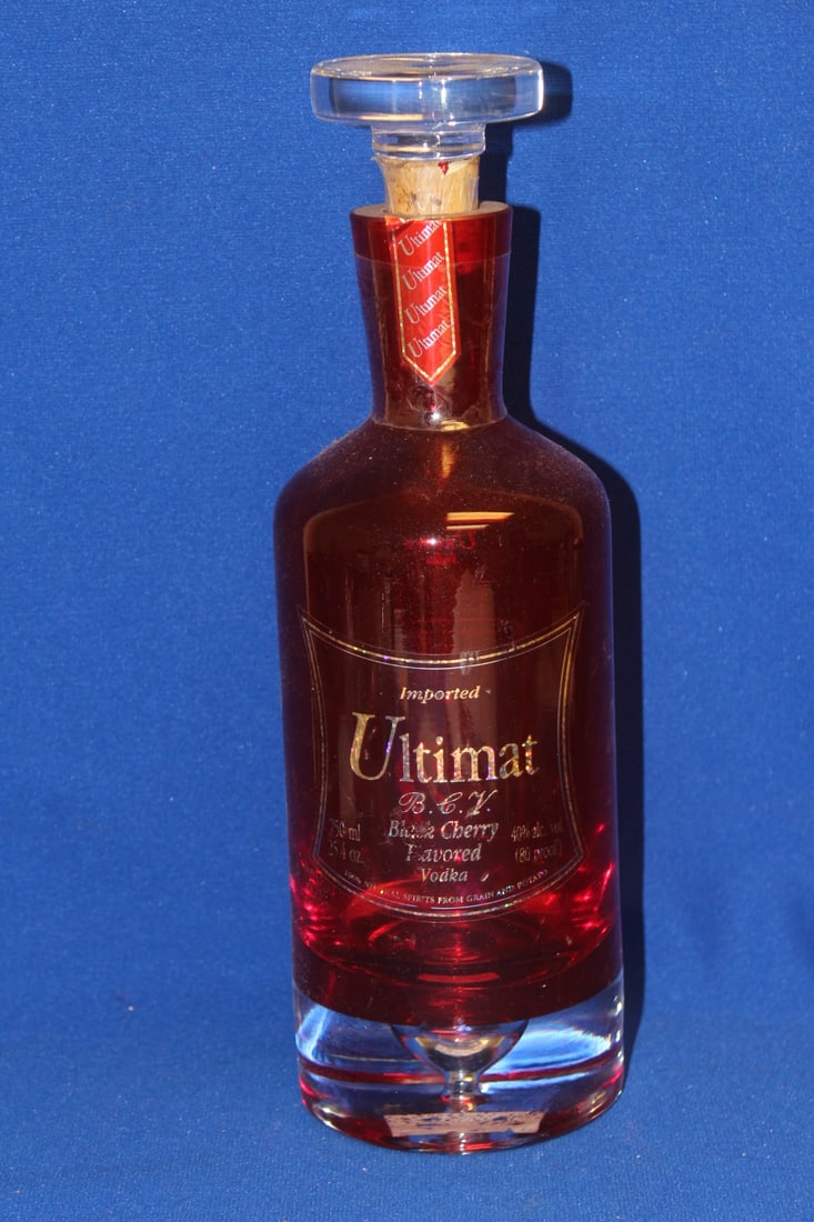 A Ruby Red Artglass Decanter: 11" tall