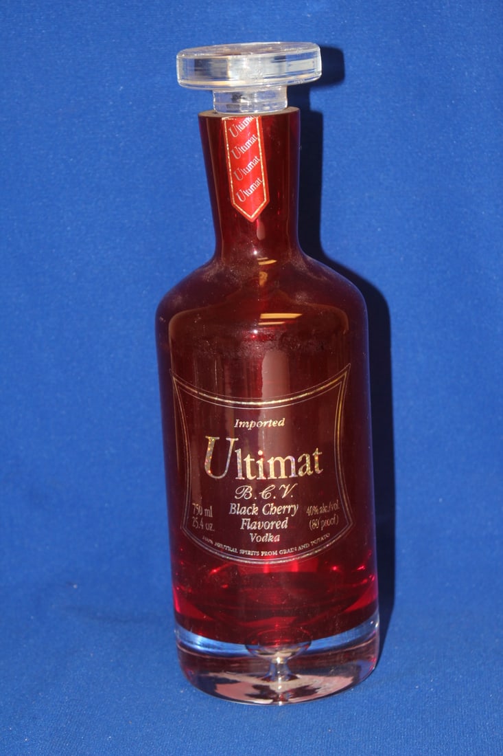 A Ruby Red Artglass Decanter: 11" tall