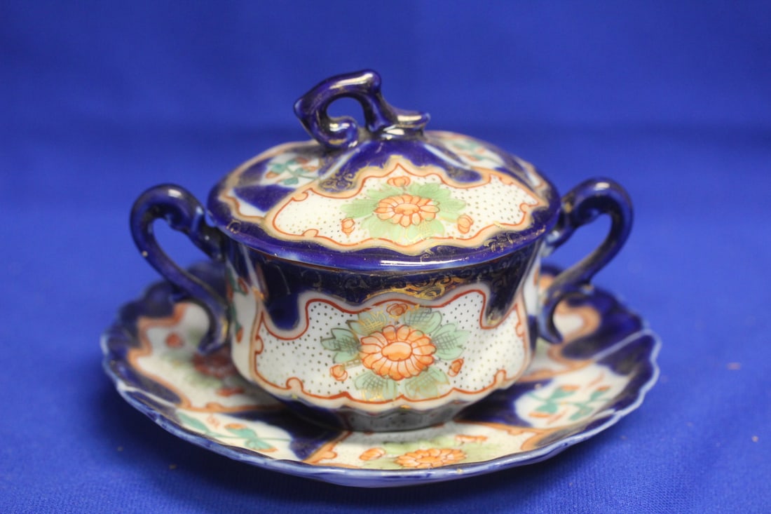 A Japanese Sugar Container with Undertray: please note: chip by the handle - 4 1/2" tall