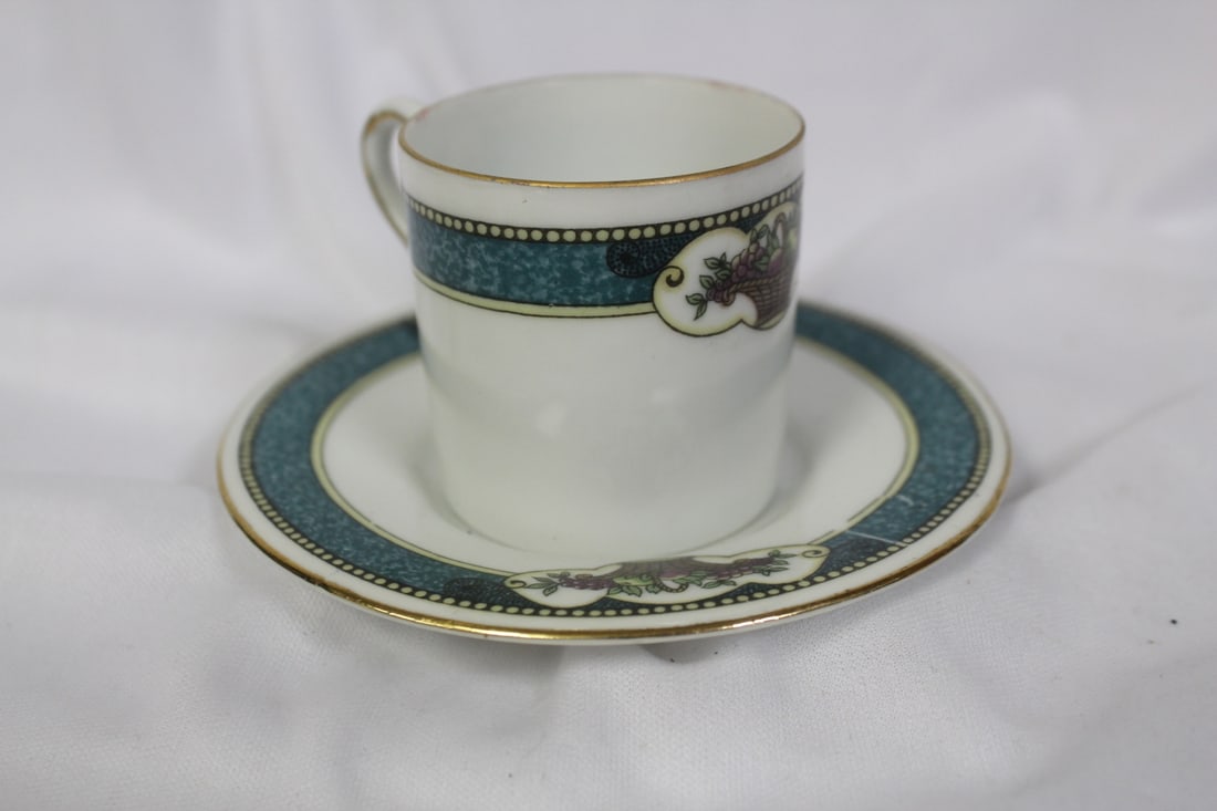 A Dematesse Cup and Saucer: 2 3/8" tall