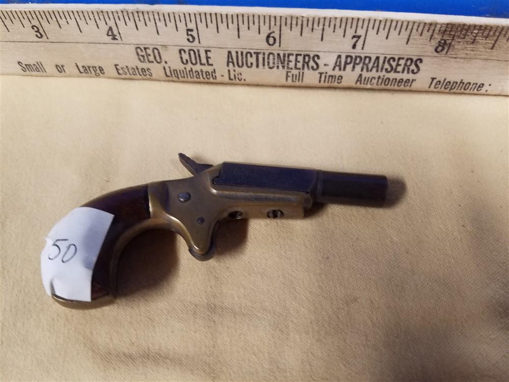 Very Very Small Butler Break Single Shot Derringer -: Very Very Small Butler Break Single Shot Derringer - .22cal - 1 7/8"bbl - Spur Trigger, Birds Eye Butt, Left Side Grip Shortened - SN 77 - Transfer Is Required, Anywhere Outside Of NY Is FFL to FFL On