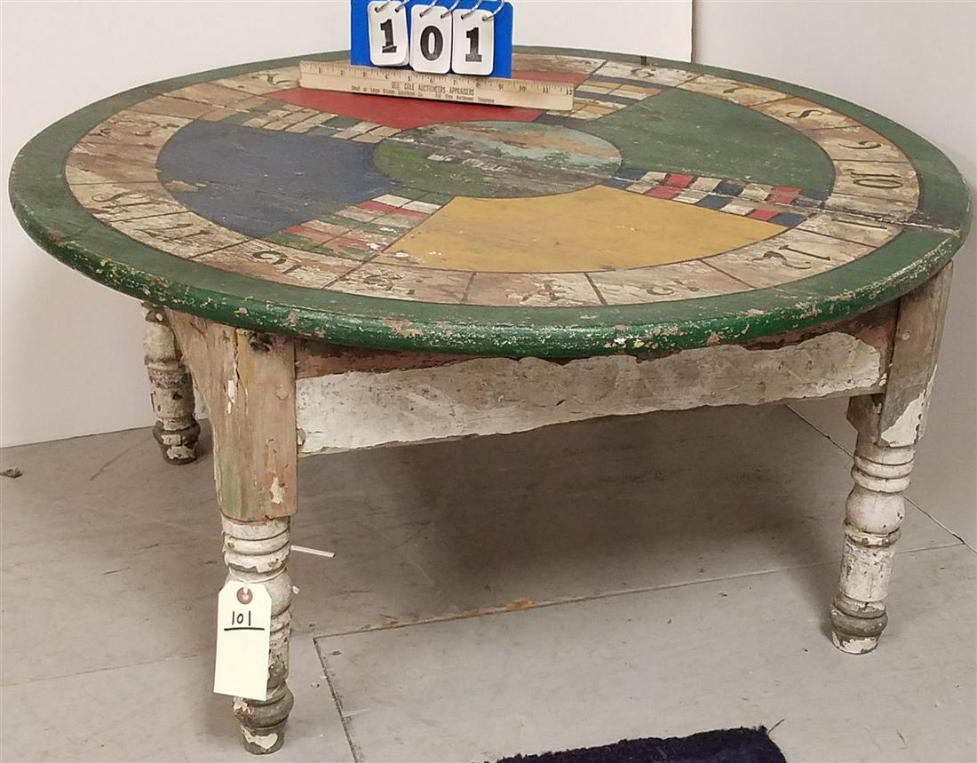 PRIM. COFFEE TABLE W/ ROULETTE WHEEL TOP, 17" X 34.5" (1 of 2)