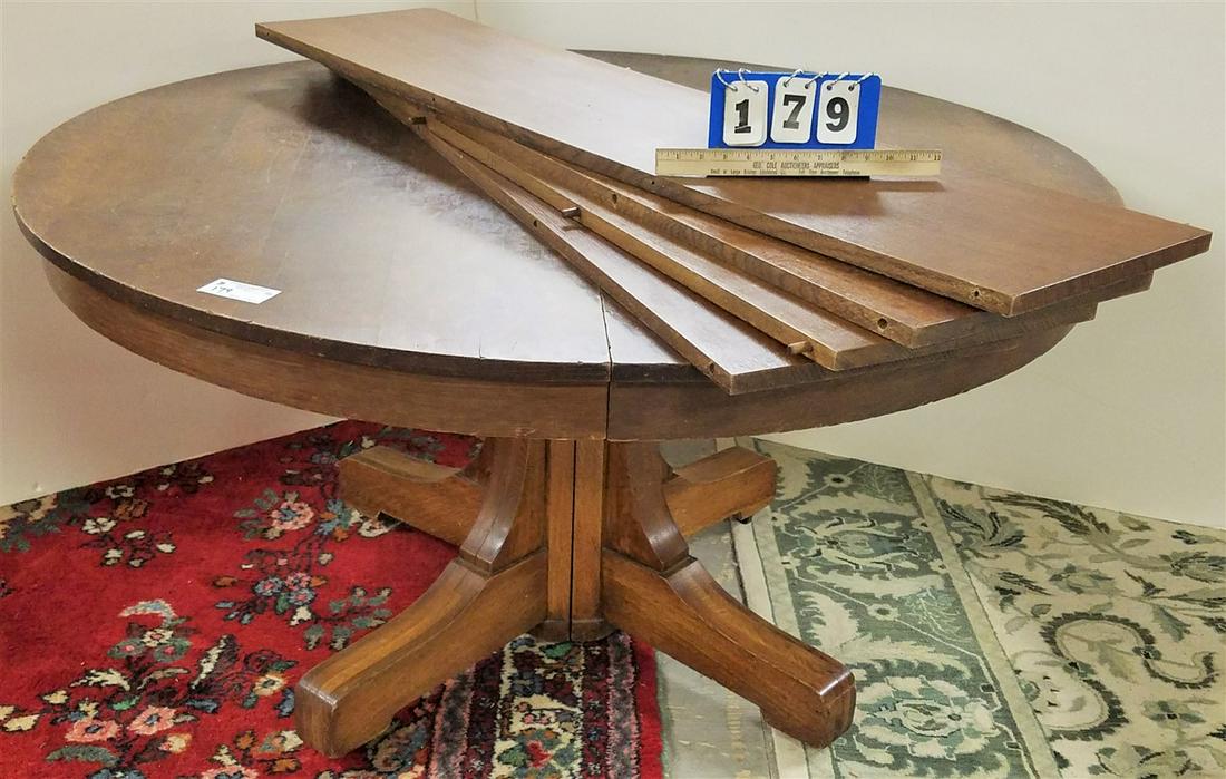 GRAND RAPIDS OAK 54" DIAM. PED. BASE TABLE W/ 4 LEAVES (1 of 1)