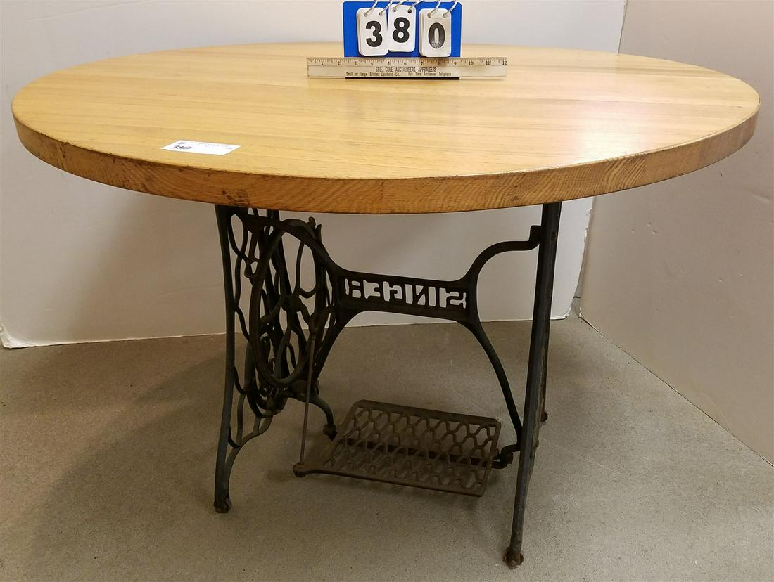 42" DIAM BUTCHER BLOCK TOP TABLE W/ SEWING MACHINE BASE (1 of 2)