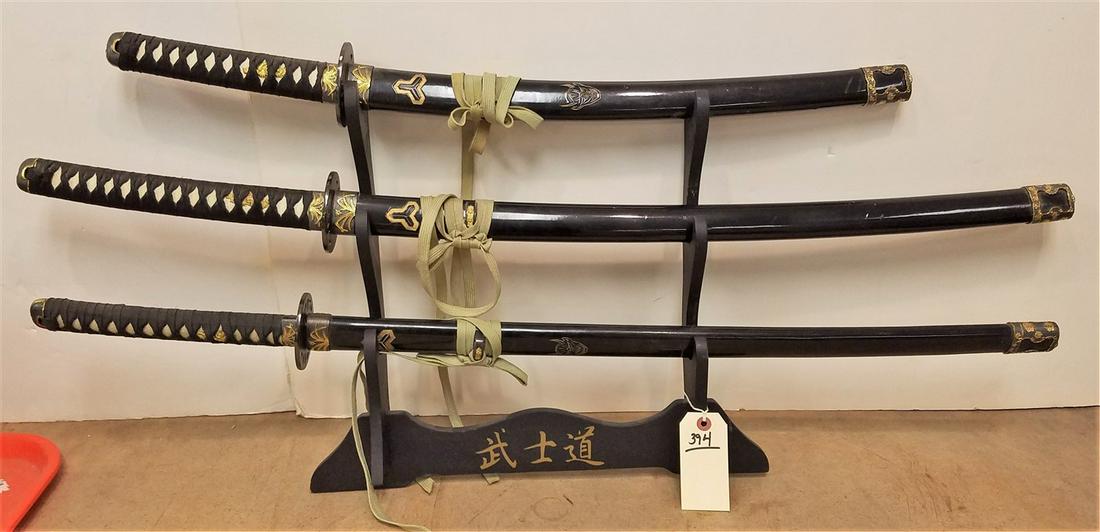 WOODEN WALL HOLDER W/ 4 SWORDS (1 of 2)