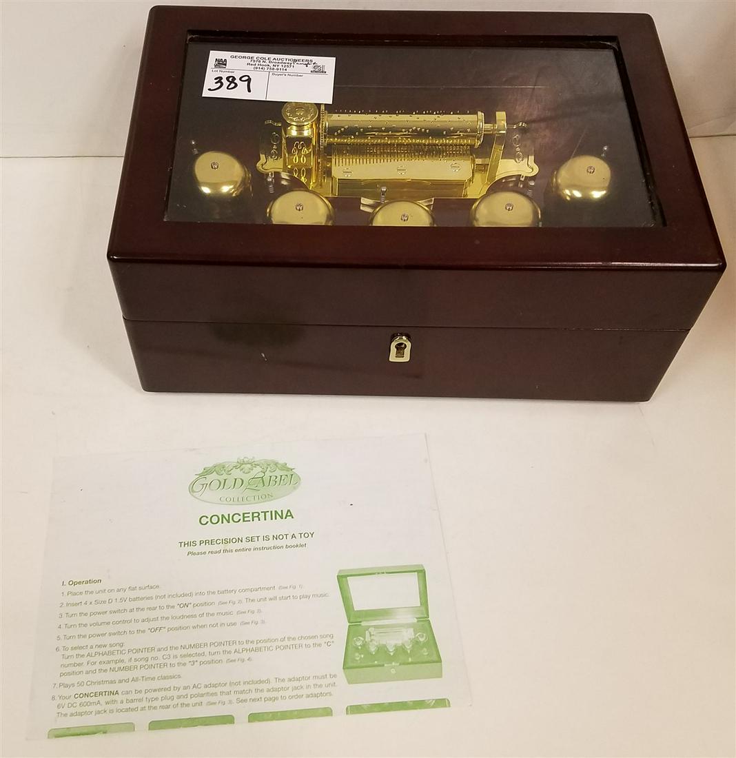 GOLD LABEL CONCERTINA MR. CHRISTMAS, 5"H X 11.75"W X: GOLD LABEL CONCERTINA MR. CHRISTMAS, 5"H X 11.75"W X 7.75"D
