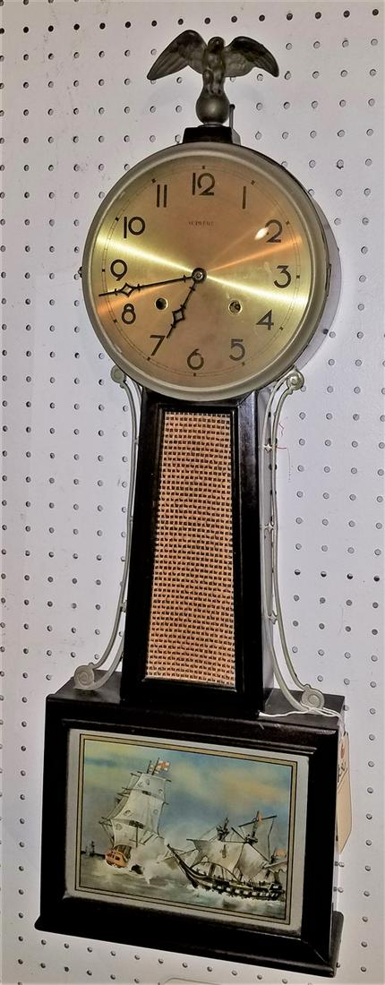 SUPREME MAHOG. BANJO CLOCK, 31"H X 11"W: SUPREME MAHOG. BANJO CLOCK, 31"H X 11"W