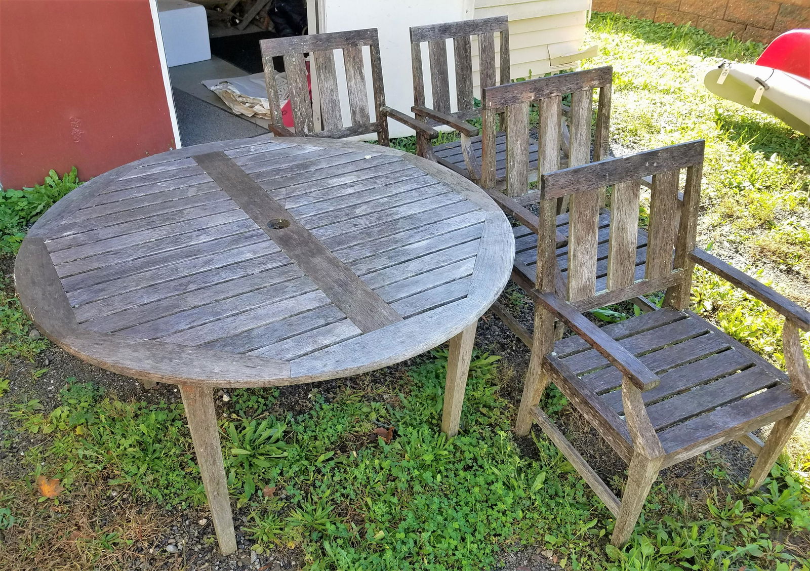TEAK TABLE 30"H X 4'6" DIAM W/ 6 ARMCHAIRS (1 of 5)