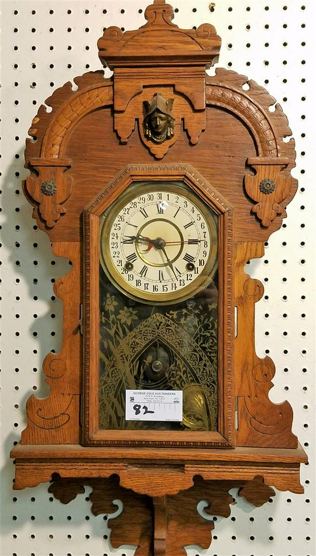 OAK CALENDAR CLOCK 29"H X 14-1/2"W X 4-1/2"D (1 of 3)
