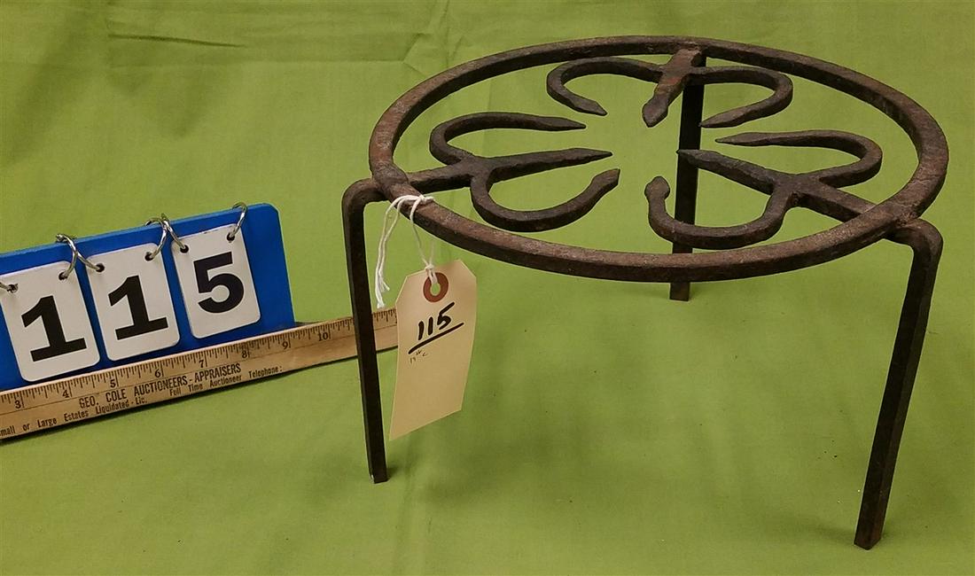 WROUGHT TRIVET 7" H X 12" DIAM.: WROUGHT TRIVET 7" H X 12" DIAM.