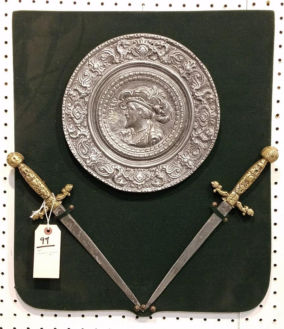 PR. COSTUME ARMOUR INC. MOUNTED METAL CHARGERS W/ PR. DAGGERS 21 1/2" X 19 1/2" (1 of 4)