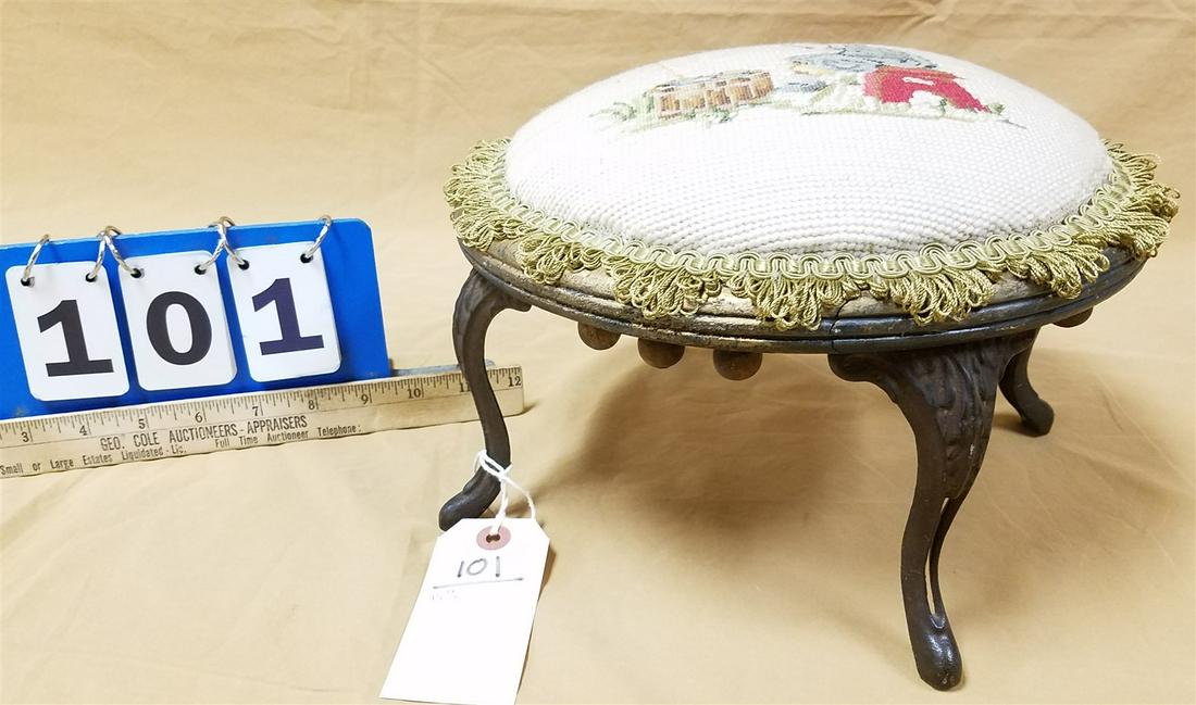 19TH C FOOTSTOOL W/NEEDLEPOINT TOP, CASTIRON LEGS 7"H X 10-1/2"DIAM (1 of 4)