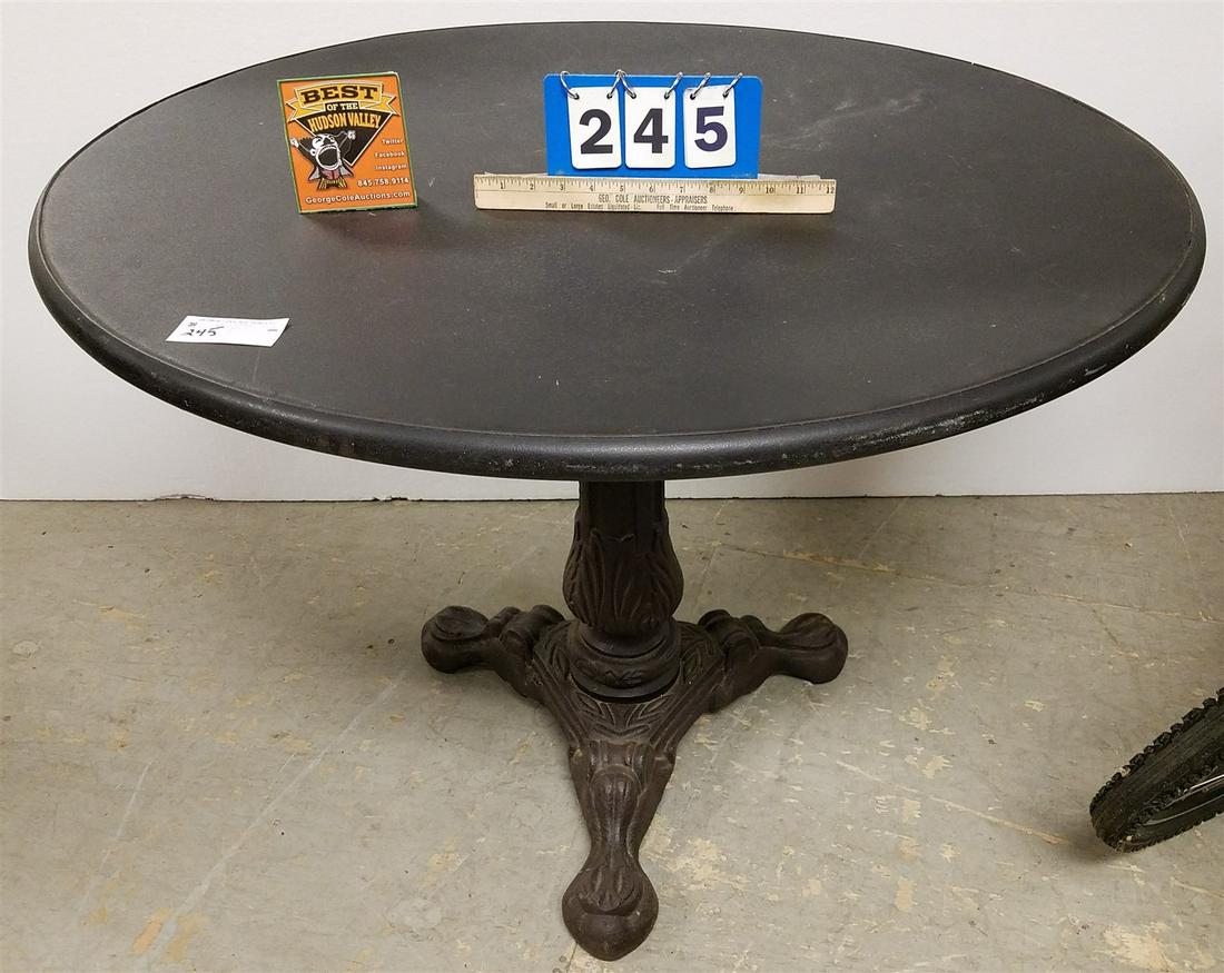 CAST IRON BASE METAL TOP PATIO TABLE 30"H X 39"DIAM. (1 of 3)