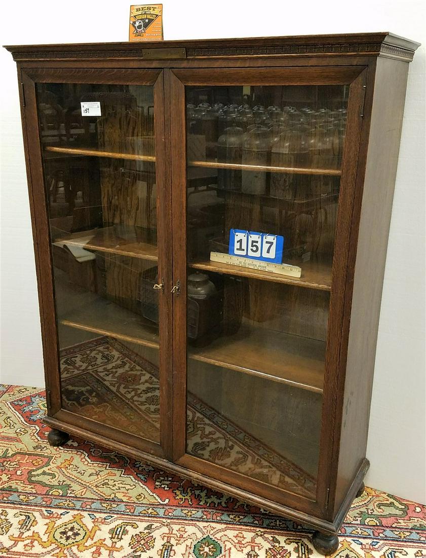 OAK 2 DOOR BOOKCASE 56"H X 46"W X 14"D (1 of 4)