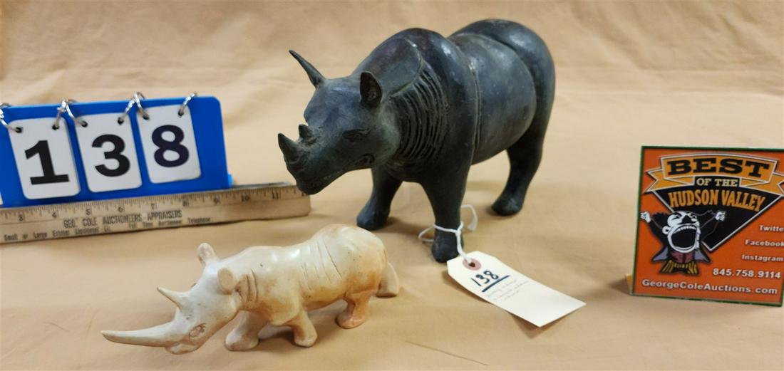 BRONZE RHINO 6 1/2"H X 11"L & CARVED STONE RHINO 3" X 8"L: BRONZE RHINO 6 1/2"H X 11"L & CARVED STONE RHINO 3" X 8"L
