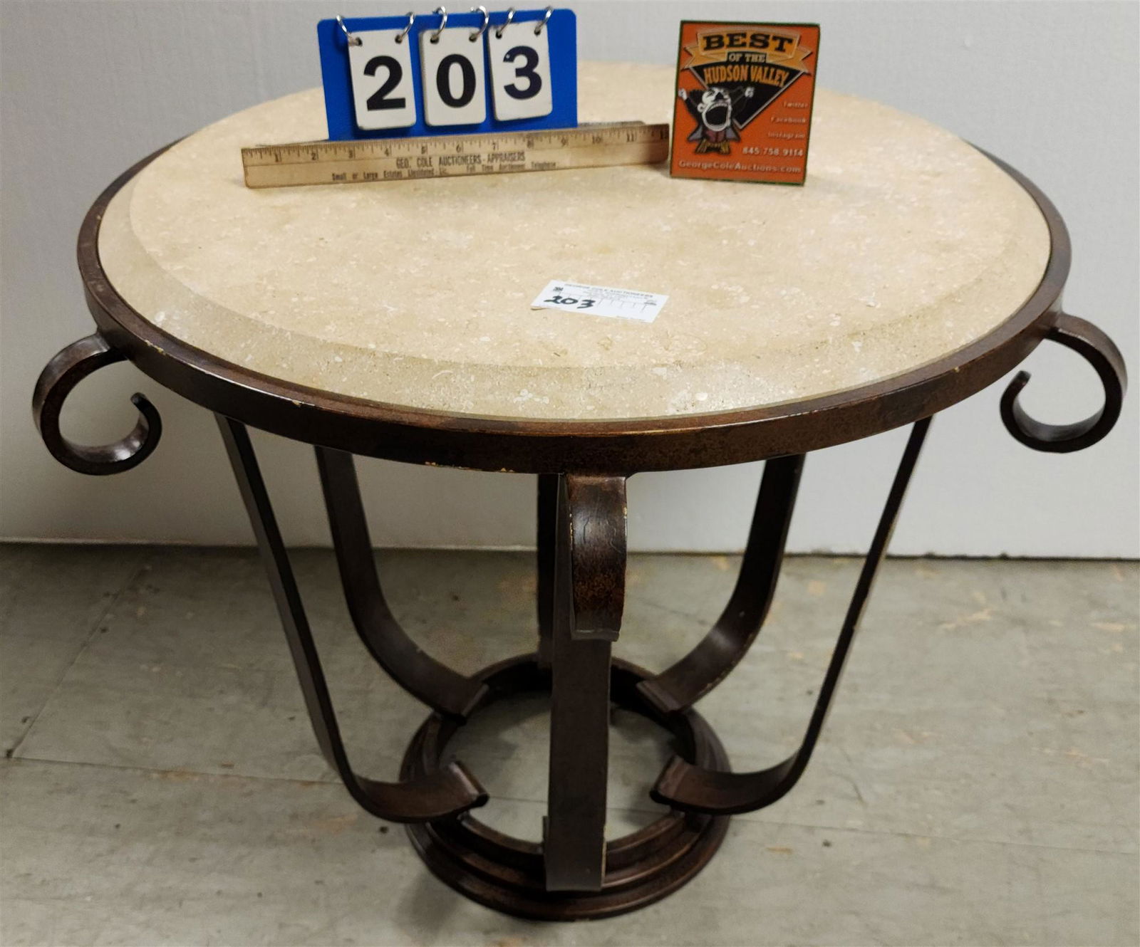 WROUGHT BASE TABLE W/TRAVERTINE TOP 25"H X 31'DIAM: WROUGHT BASE TABLE W/TRAVERTINE TOP 25"H X 31'DIAM