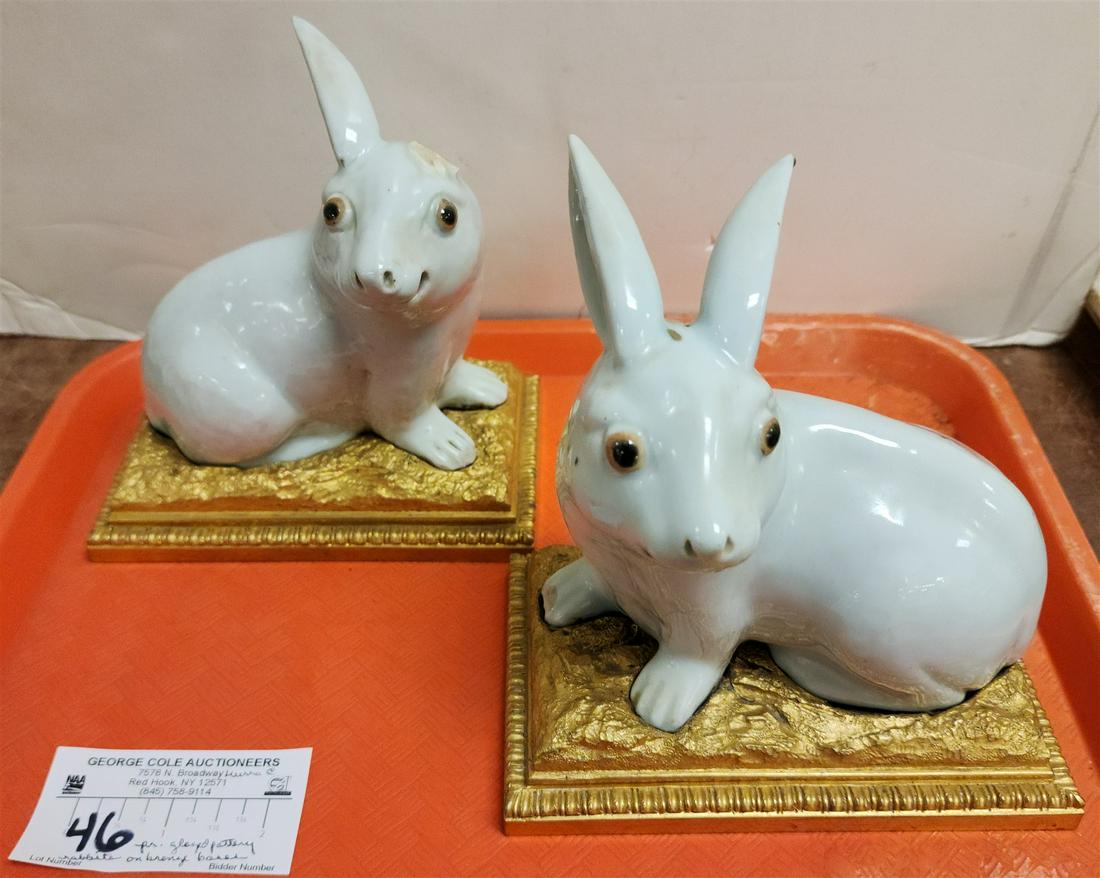 PR GLAZED POTTERY RABBITS ON GILT BRONZE BASES 6 1/2"H X 6"W X 3 3/4"D (1 EAR MISSING) (POSS.MING) (1 of 2)