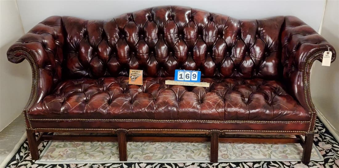 RED LEATHER TUFTED CAMEL BACK SOFA 35"H X 7'L X 20"D (1 of 3)