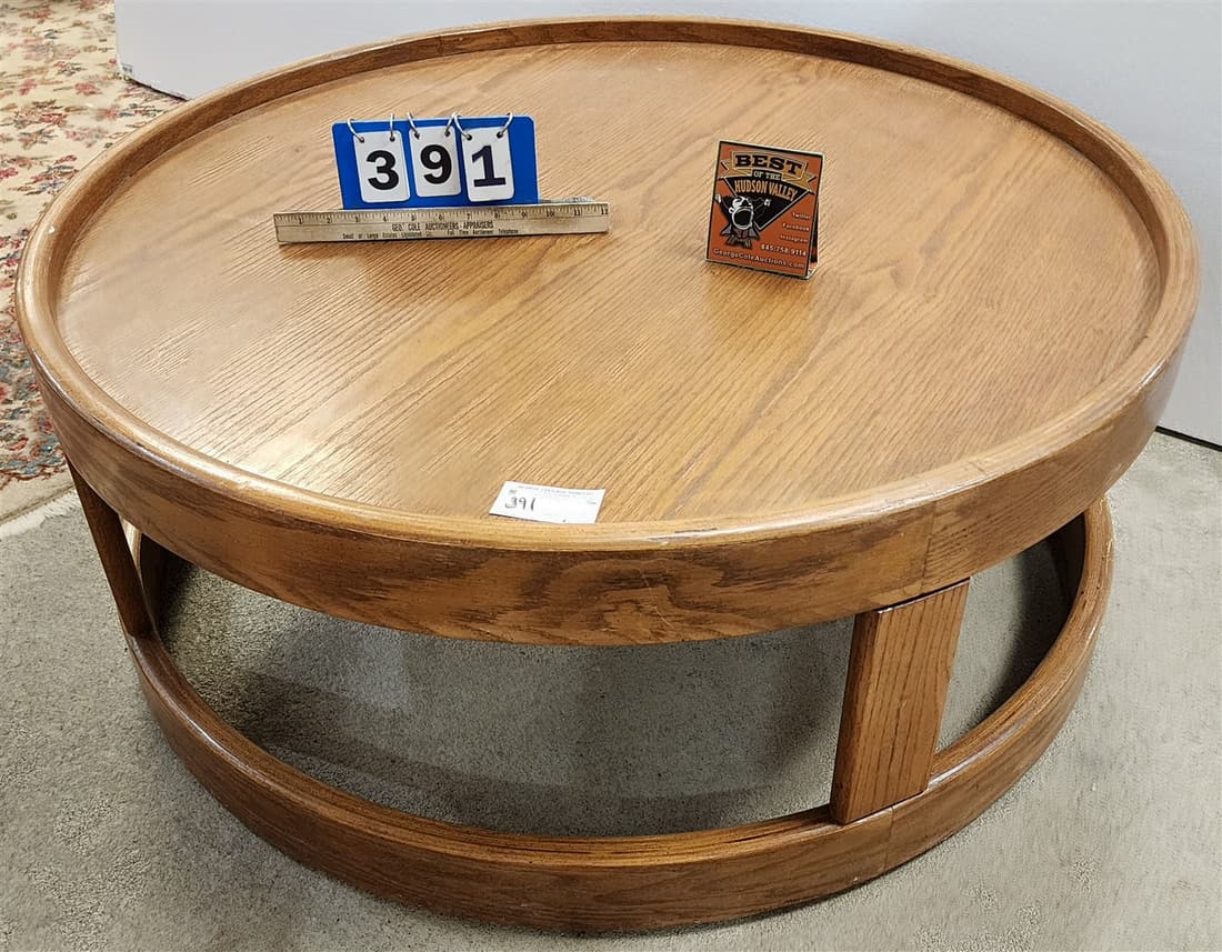 OAK COFFEE TABLE 16-1/2"H X 41"DIAM (1 of 2)