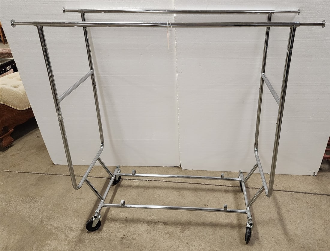 Chrome Rolling Clothes Rack 56"H X 50 1/2"W X 20 1/2"D W/ 12" Extenders (1 of 2)