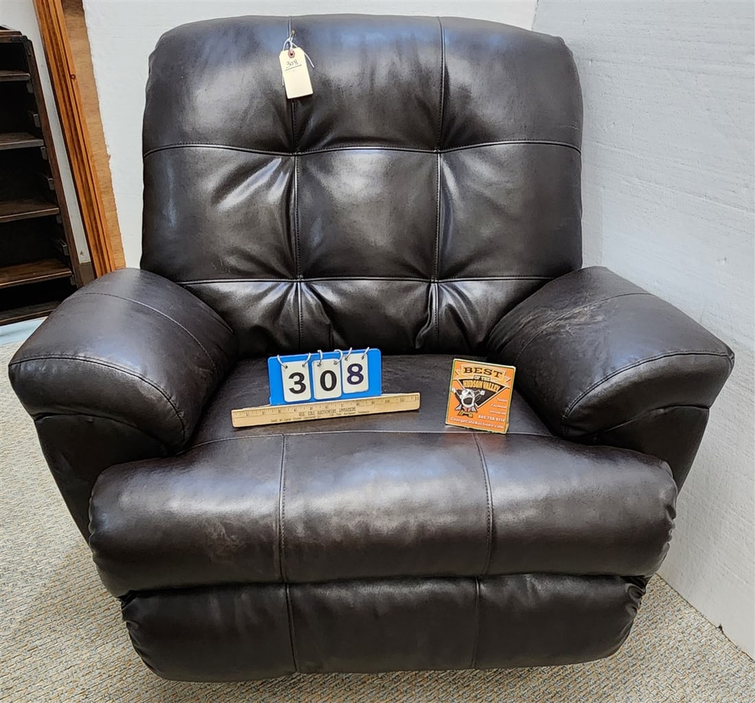 Naugahide Uphols. Recliner 39" H X 42" W X 24" D: Naugahide Uphols. Recliner 39" H X 42" W X 24" D
