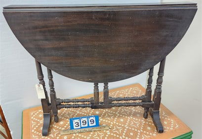 Mahog. Drop Leaf Book Table 29 1/2" H X 4 1/2" W X 36" D Opens To 36" Diam.