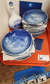 Tray 24 Pc. Royal Copenhagen Christmas Plates 1964 -1984, 88, 1986 + 1987 Comm. Plate + 10" Bottle