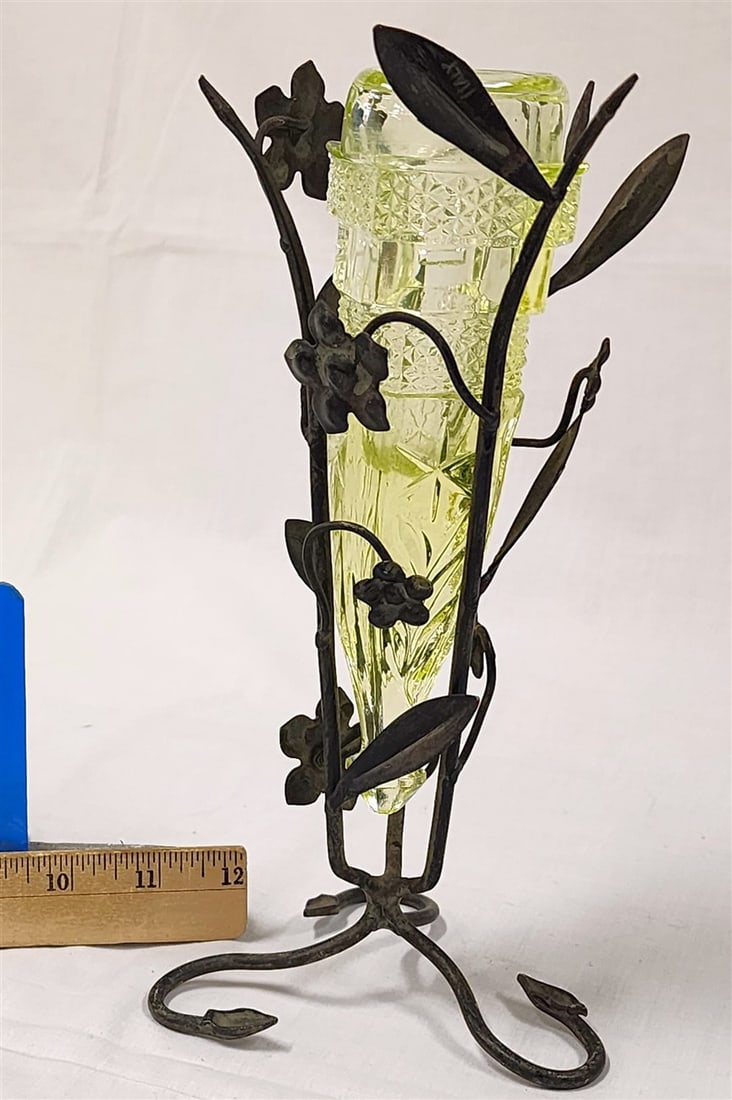Vaseline Glass Vase In A Wrought Holder 9 1/2": Vaseline Glass Vase In A Wrought Holder 9 1/2"