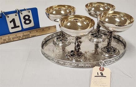 Silverplate Tray 1" H x 11 1/4" W X 8 3/4" D w/4 Spanish Figural Base Silverplate Champaigns