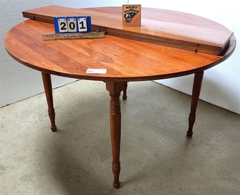 Cherry 48" Diam. Dining Table w/2-10" Leaves