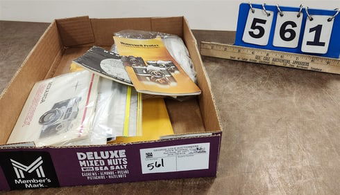 Tray of Camera Manuals
