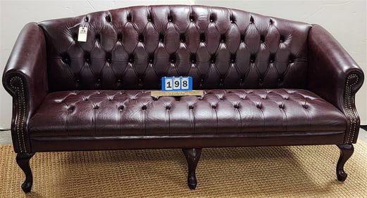 Leather Uphols. Sofa 35" H X 6'5" W X 21" D