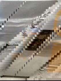 Frigidaire 2 Door Stainless Refrigerator 70" H X 33" W X 31 1/2" D