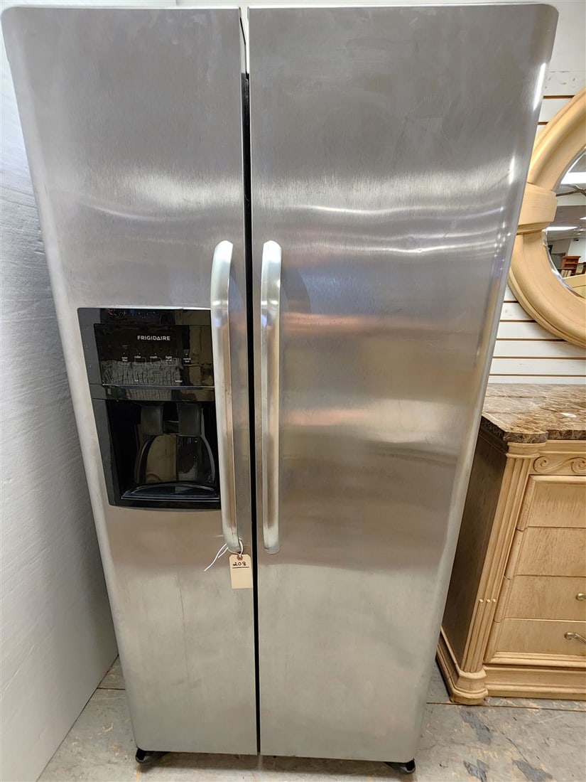 Frigidaire 2 Door Stainless Refrigerator 70" H X 33" W X 31 1/2" D (1 of 7)