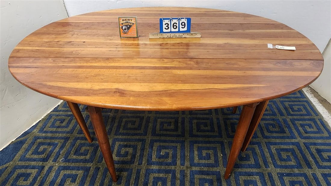 Cherry Drop Leaf Table 29" H X 66" L X 52" W, Open (1 of 3)