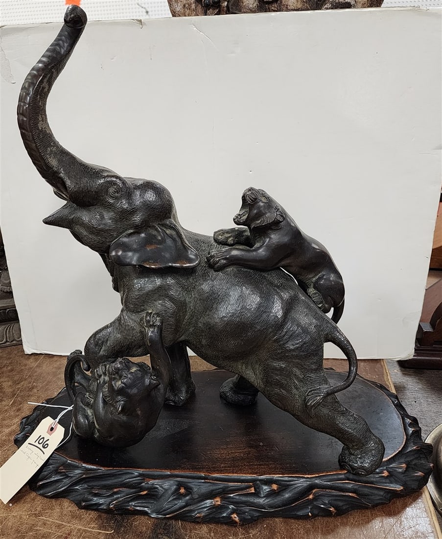 Bronze Elephant & Tiger Group 17" H X 14" L On Carved Wooden Base 1 1/2" H X 19 1/2" L X 9 1/2" W: Bronze Elephant & Tiger Group 17" H X 14" L On Carved Wooden Base 1 1/2" H X 19 1/2" L X 9 1/2" W