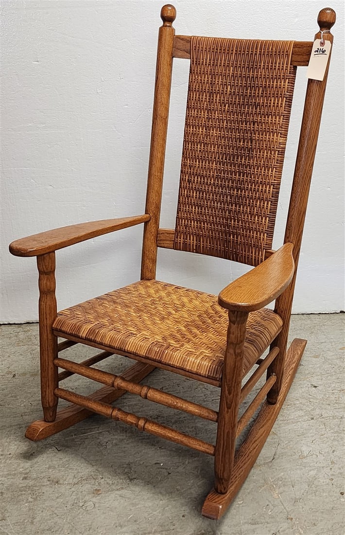 Oak Porch Rocker w/Woven Back & Seat 43 1/2" H X 27 1/2" W X 17 1/2" D (1 of 3)